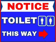 Notice toilet this way